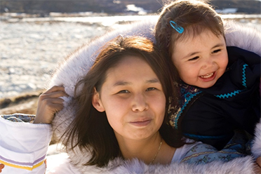 Indigenous woman with a toddler
