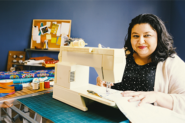 Woman working at a sewing machine